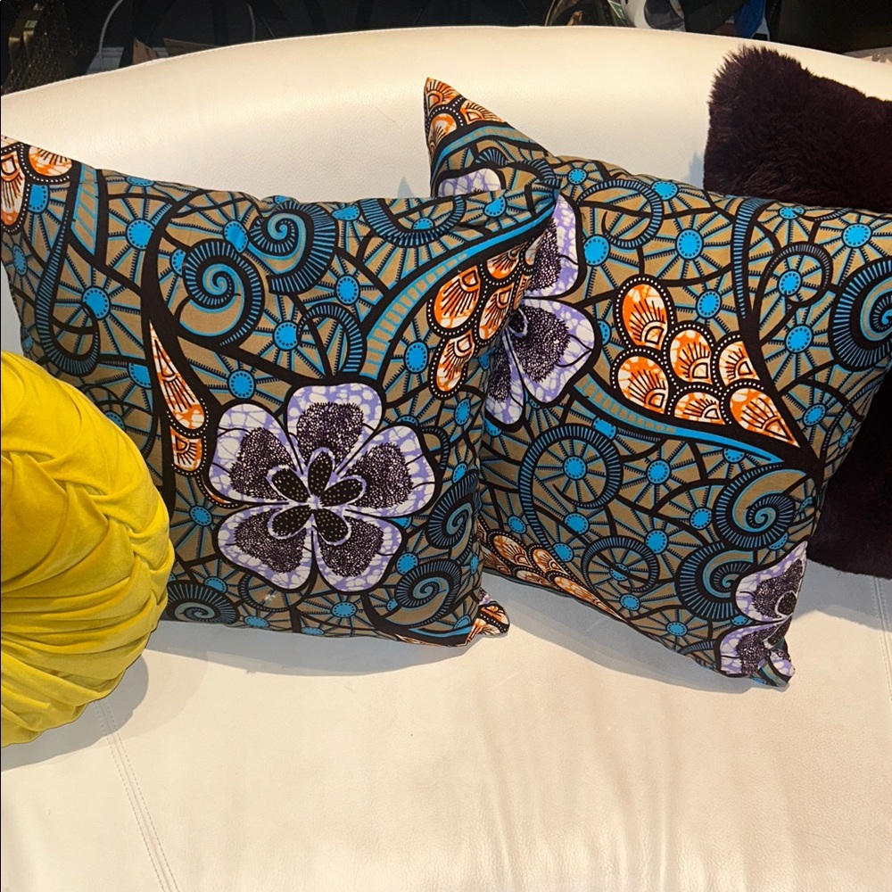 Love Culture Accent Pillows with Blue and Orange Patterns